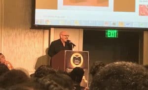 Radio host Tom Joyner addresses the crowd at the 10th National Conference of African American Librarians in Atlanta on August 10.