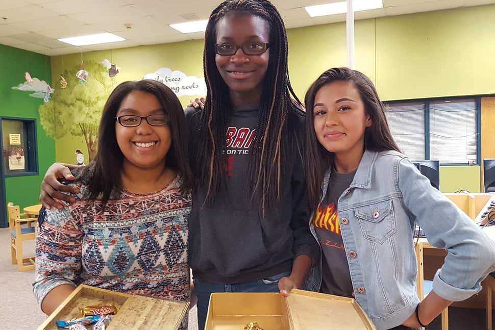 Students gather in the library at Highland Junior High School in Mesa, Arizona. Librarian April Lesher’s efforts to create a bullying-free zone have helped students feel accepted in a safe learning environment.