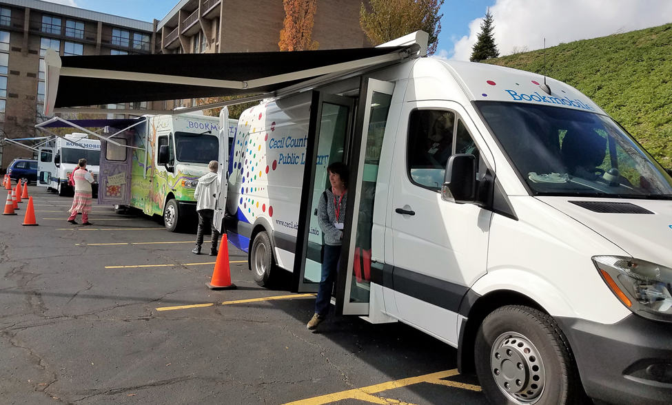 Bookmobiles on display at the Association of Bookmobile and Outreach Services conference in Pittsburgh, October 25–27, 2017.