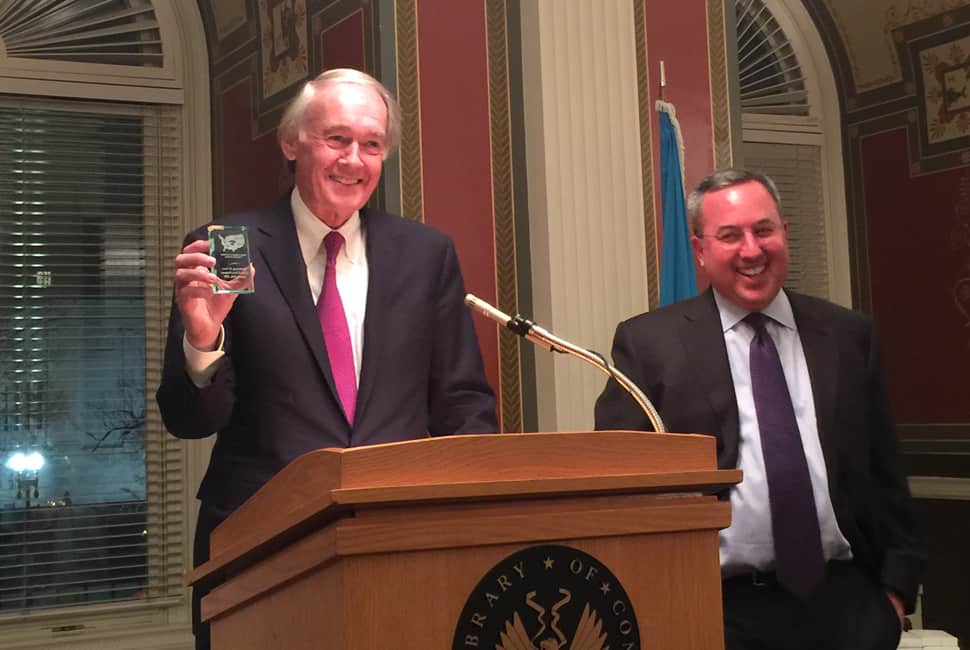 Sen. Ed Markey (D-Mass.) receives an award from the National Coalition for Technology in Education and Training on the 20th anniversary of the E-Rate program.