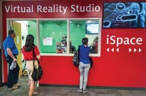 Students, faculty, and community members experience VR at the University of Arizona iSpace during the Tucson Festival of Books. Photo: Travis Teetor