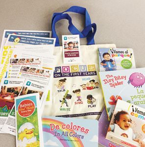 Baltimore County (Md.) Public Library staffers distribute bags of early literacy materials to the families they serve at WIC clinics. <span class="credit">Photo: Baltimore County (Md.) Public Library</span>