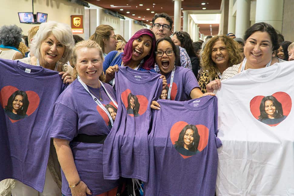 Attendees of the American Library Association's 2018 Annual Conference and Exhibition in New Orleans display matching Michelle Obama T-shirts ahead of the Opening General Session. Photos: Cognotes and Rebecca Lomax/American Libraries
