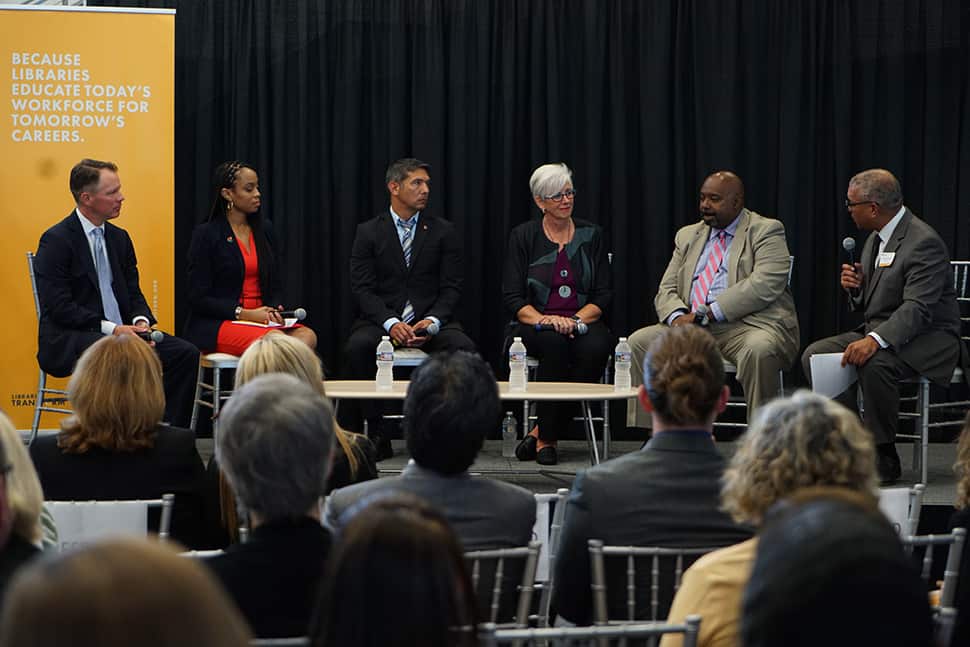 The “Libraries Educate Today's Workforce for Tomorrow's Careers” panel held on August 9 in Cleveland. From left: Ryan Burgess, director of the Governor's Office of Workforce Transformation; Shontel Brown, Cuyahoga County Council representative for district 9; Mick Munoz, a former Marine and Ohio library patron; Denise Reading, CEO of GetWorkerFIT; and Jeff Patterson, CEO of Cuyahoga Metropolitan Housing Authority; and moderator Russ Mitchell, WKYC-TV anchor and managing editor.