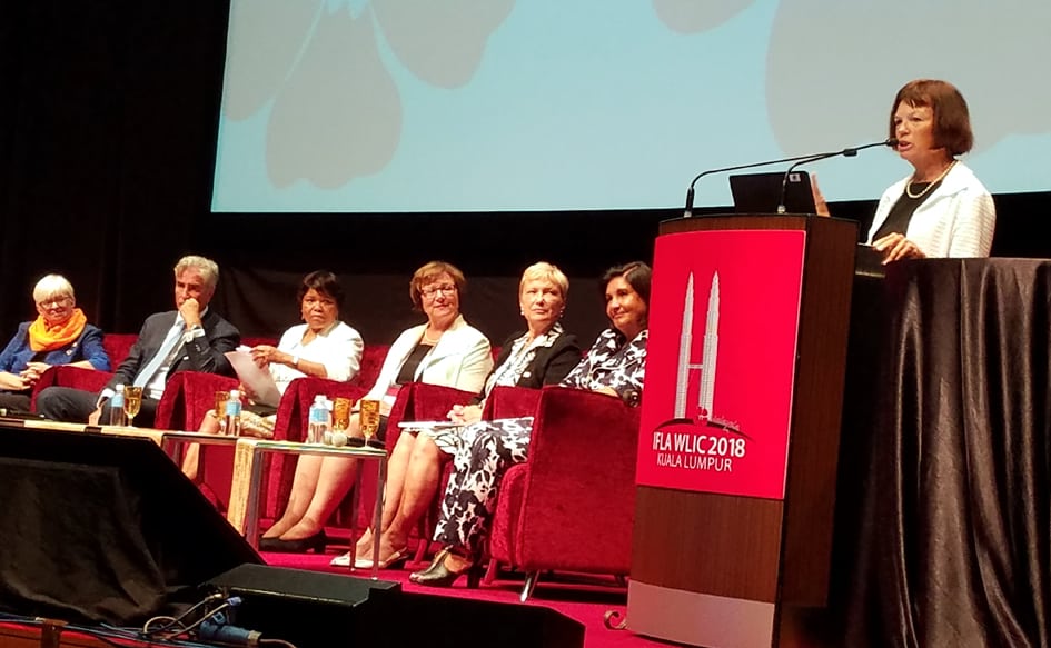 Multiple IFLA leaders take the stage in Kuala Lumpur, Malaysia. From left: Claudia Lux, IFLA Secretary General Gerald Leitner, Ellen Tise, Sinikka Sipilä, Ingrid Parent, Glòria Pérez-Salmerón, and Donna Scheeder.