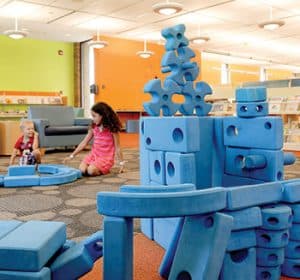 Children play with the Imagination Playground blocks at Arlington Heights (Ill.) Memorial Library.