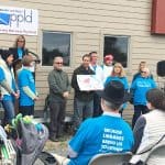 American Library Association President Loida Garcia-Febo (at podium) addresses the crowd at the High Prairie Library Harvest Festival in Falcon, Colorado, as part of her Libraries = Strong Communities tour.