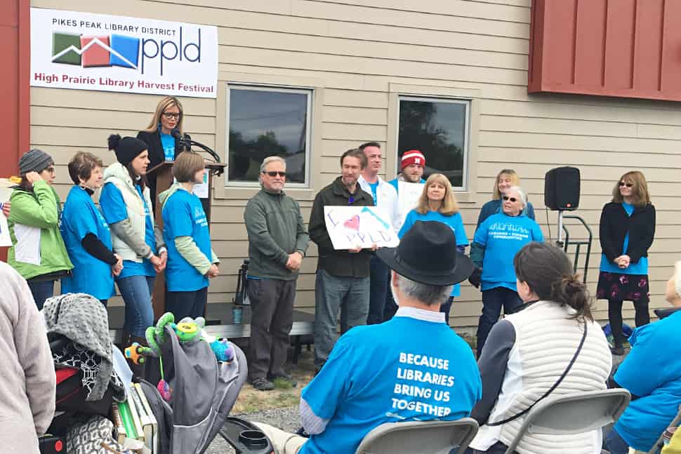 American Library Association President Loida Garcia-Febo (at podium) addresses the crowd at the High Prairie Library Harvest Festival in Falcon, Colorado, as part of her Libraries = Strong Communities tour.