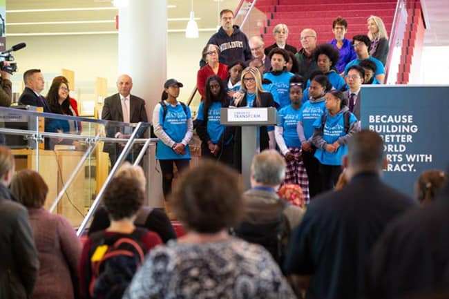 ALA President Loida Garcia-Febo (center) speaks at a rally at Cambridge (Mass.) Public Library. Photo: Mark Ostow Photography