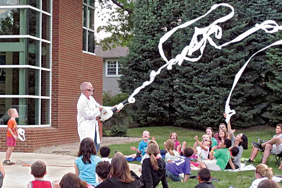 Dr. Dave demonstrates Bernoulli’s principle with a leaf blower and toilet paper at Ohio State University’s Whiz Bang Science Café at Worthington Libraries. Photo: Worthington (Ohio) Libraries