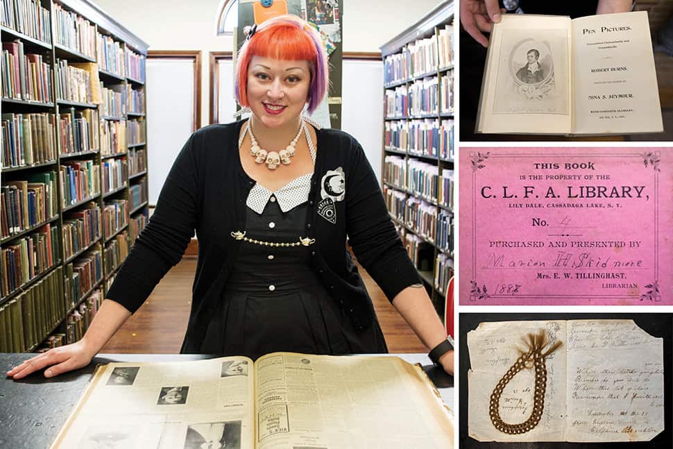 Clockwise from top right: Pen Pictures, a book of channeled poetry by Robert Burns published in Lily Dale in 1900; the signature pink bookplate of Skidmore’s original library, the Cassadaga Lakes Freethought Association Library; memento mori hair bracelet found inside an 1882 channeled Spiritualist text titled Oahspe; Amanda Shepp examines The Sunflower, a Spiritualist journal published in Lily Dale, 1898–1909. (Photos: Brittany Ford)