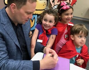 Pilkey signs autographs for admiring fans. Photo: St. Louis County (Mo.) Public Library