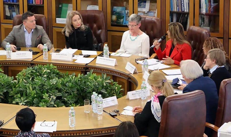 American Library Association President Loida Garcia-Febo (in red) speaks to librarians at the Russian State Library in Moscow.