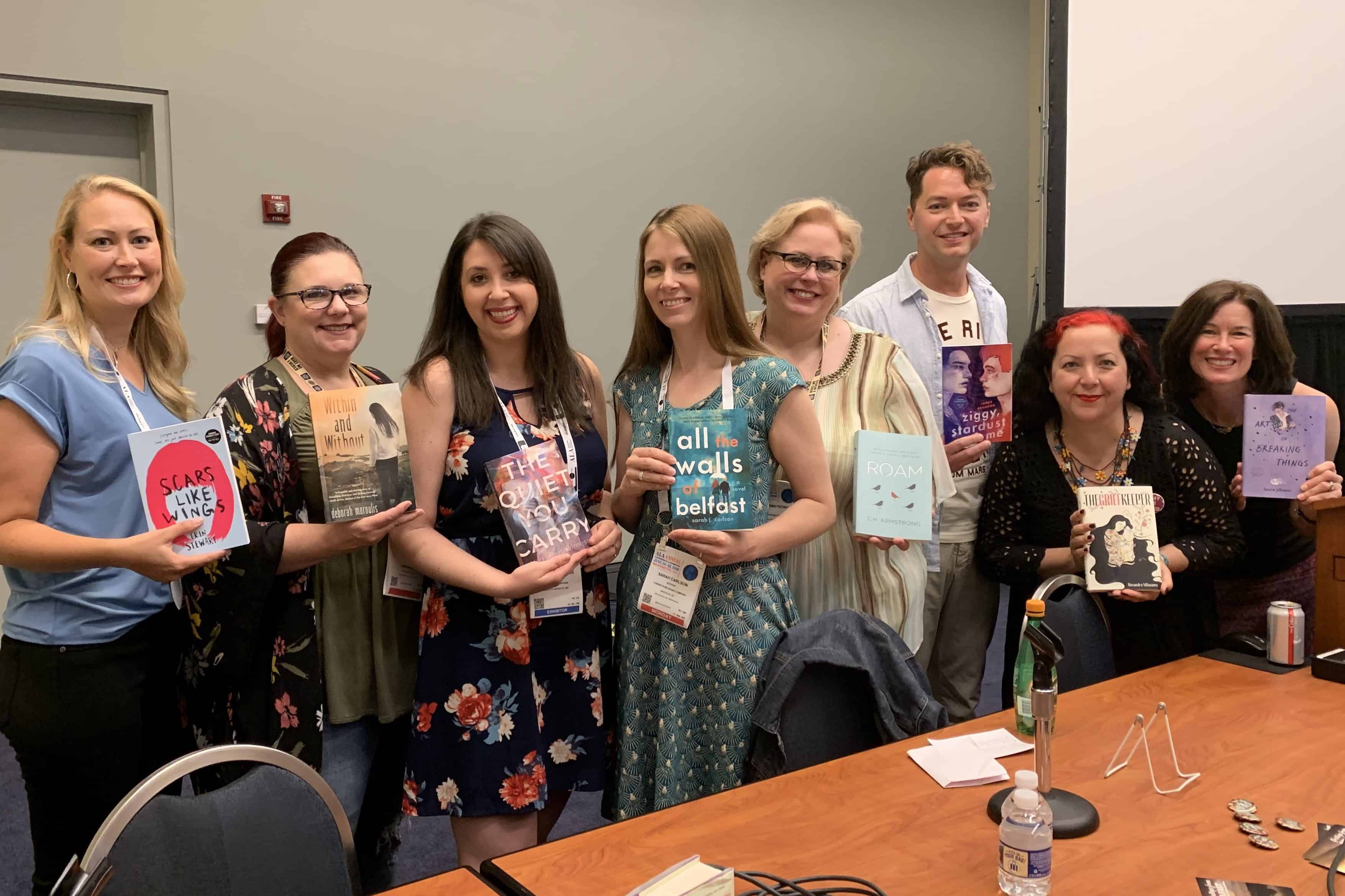 left to right) Erin Stewart, Deborah Maroulis, Nikki Barthelmess, Sarah J. Carlson, C. H. Armstrong, James Brandon, Alexandra Villasante, and Laura Sibson