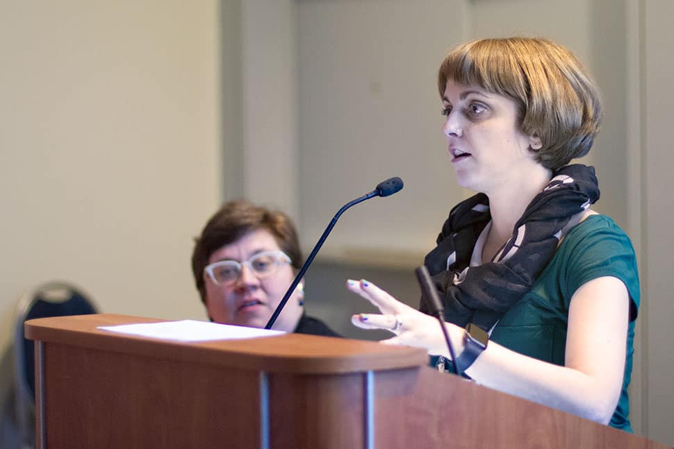 Amy Tureen (left, seated) and Amanda Melilli (right, standing at podium).