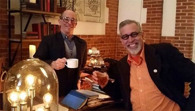 Adam Zand (left) and Greg Peverill-Conti take a break in the Map Room Tea Lounge at Boston Public Library in Copley Square (Photo: Library Land Project Instagram).