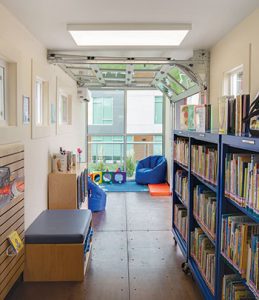 Windows and a garage door make the 320-square-foot building feel more spacious. <span class="credit">Photo: Macey Snelson/Meridian (Idaho) Library District</span>