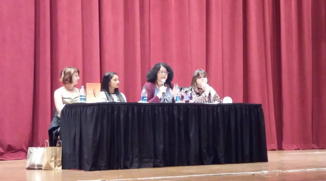 From left, YA authors Lauren Myracle, Sandhya Menon, Kekla Magoon, and Meredith Russo speak at the Opening Session of the Young Adult Library Services Association’s Young Adult Services Symposium on November 1 in Memphis, Tennessee.