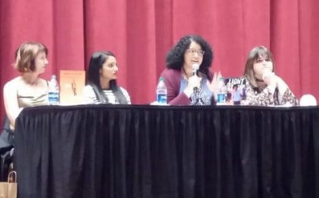 From left, YA authors Lauren Myracle, Sandhya Menon, Kekla Magoon, and Meredith Russo speak at the Opening Session of the Young Adult Library Services Association’s Young Adult Services Symposium on November 1 in Memphis, Tennessee.