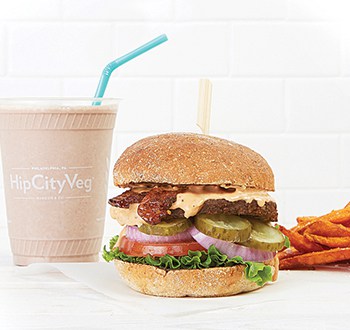 Chocolate milkshake, Ziggy burger, and sweet potato fries at HipCityVeg. Photo: HipCityVeg.