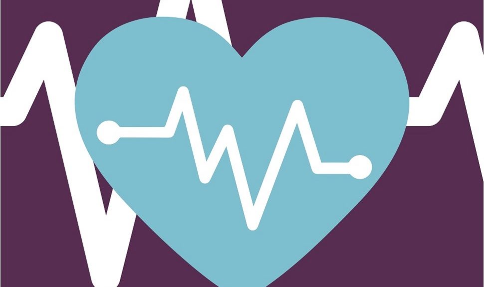 Blue heart on purple background with heartbeat graph.