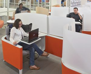 Dividers at Tulsa City–County (Okla.) Library’s Central location encourage physical distancing. <span class="credit">Photo: Lara Swimmer</span>