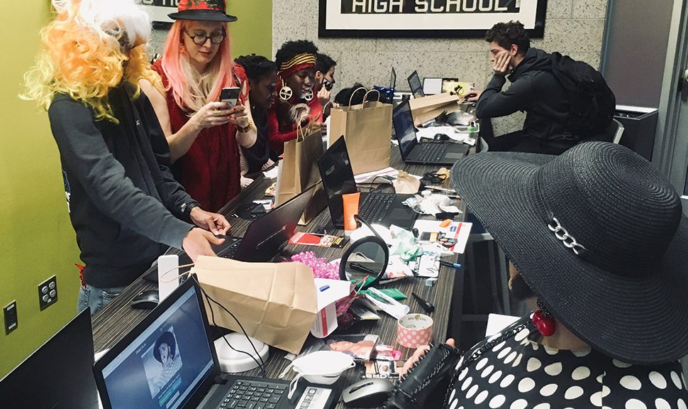 Teen participants in Boston Public Library’s “Drag vs. AI” program test their makeup and props against facial recognition software. (Photo: Kathy Pham/American Civil Liberties Union of Massachusetts)