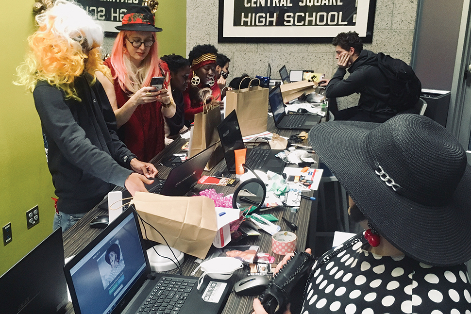 Teen participants in Boston Public Library’s “Drag vs. AI” program test their makeup and props against facial recognition software. (Photo: Kathy Pham/American Civil Liberties Union of Massachusetts)