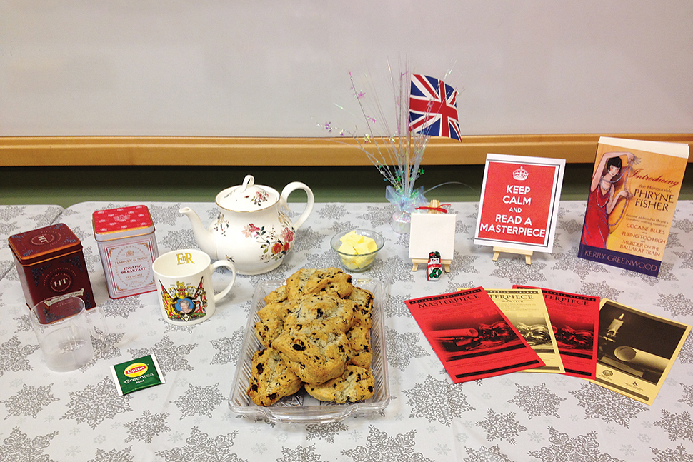 The Masterpiece Book Club at Chicago Public Library’s Vodak–East Side branch hosted a Miss Fisher–themed holiday party in 2015. Photo: Nancy Devlin