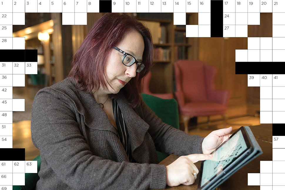 Laura Braunstein, digital humanities librarian at Dartmouth College in Hanover, New Hampshire, completes a crossword on her tablet. (Photo: Eli Burakian/Dartmouth College)