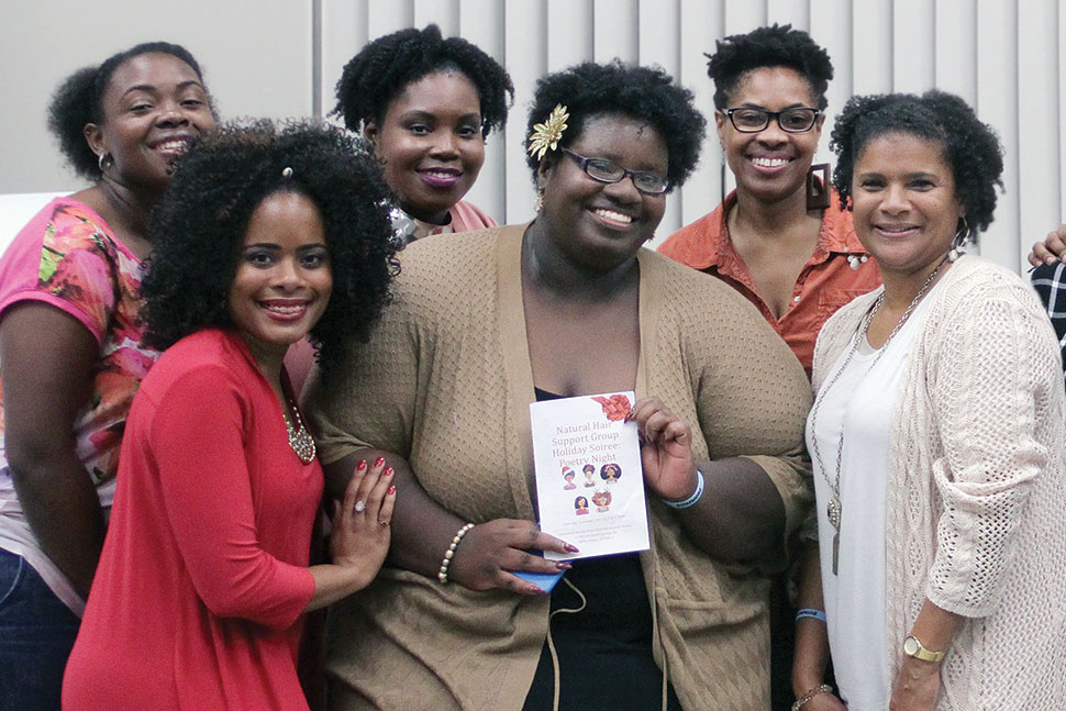 In November 2017, more than 120 people attended a poetry event hosted by the Natural Hair Support Group at East Baton Rouge Parish (La.) Library’s Greenwell Springs Road Regional branch. The group was founded by Adult Services and Reference Librarian Nicollette M. Davis (holding program book). z