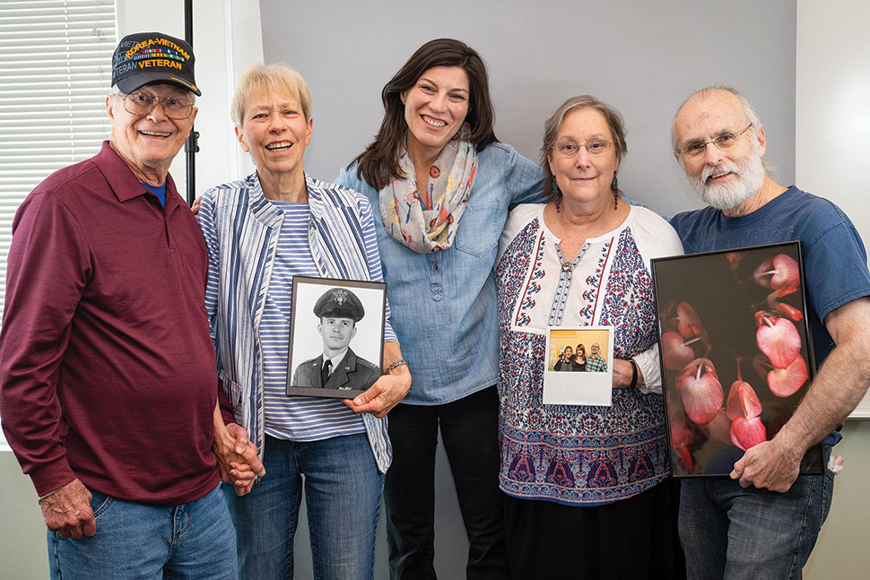 Group of seniors pose together after a library activity