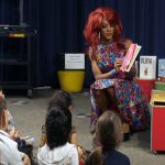 Drag queen reads a book to children (Photo: Jennifer Ricard)