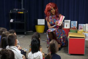 Drag queen reads a book to children (Photo: Jennifer Ricard)