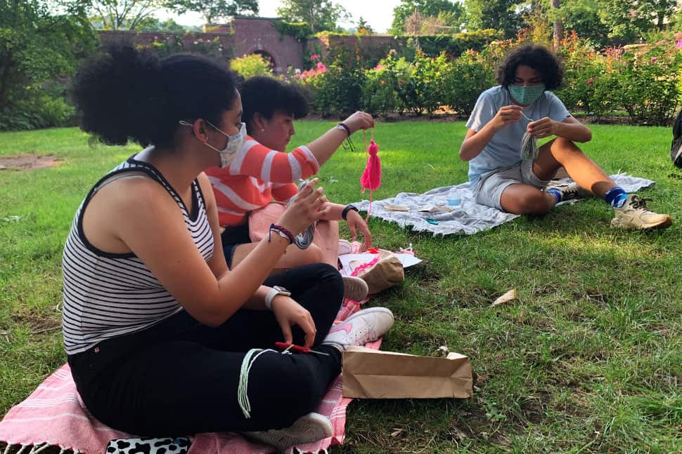 Program attendees complete a craft to as a part of the Latinx Book Club discussion at Montclair (NJ) Public Library. This program was developed and led by intern Jack Rodriquez-Vars, age 17. Photo: Jack Rodriquez-Vars.