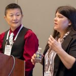 KayCee Choi (standing at left) and Alicia Deal (standing at right), librarians at Dallas Public Library, present at "Deaf Culture: A Strategy for Inclusive Deaf Community Engagement,” a June 26 session at ALA’s 2022 Annual Conference and Exhibition in Washington, D.C. Photo by Rebecca Lomax for American Libraries.