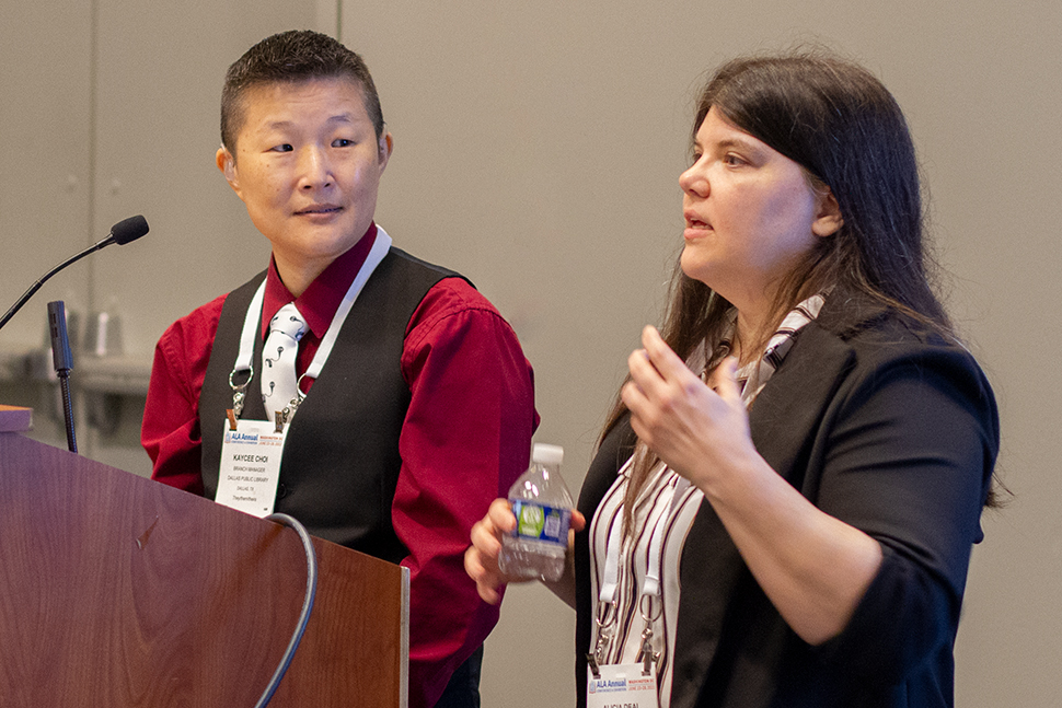 KayCee Choi (standing at left) and Alicia Deal (standing at right), librarians at Dallas Public Library, present at "Deaf Culture: A Strategy for Inclusive Deaf Community Engagement,” a June 26 session at ALA’s 2022 Annual Conference and Exhibition in Washington, D.C. Photo by Rebecca Lomax for American Libraries.