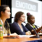 Catherine Tong (seated at left), Bridget Kowalczyk (seated center), and Tiffany Bradford-Oldham (seated at right) speak about the speech and debate program they run at San José (Calif.) Public Library at the American Library Association's 2022 Annual Conference and Exhibition in Washington, D.C., on June 25. Photo by Rebecca Lomax/American Libraries.