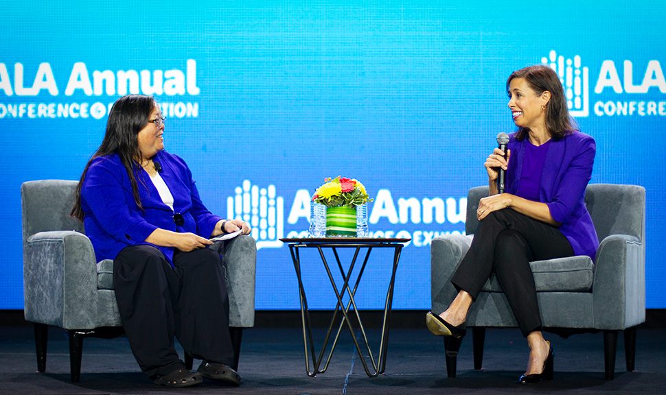 American Library Association (ALA) President Patricia "Patty" M. Wong (left) and Federal Communications Commission Chair Jessica Rosenworcel discuss the state of the digital divide in the US at the Opening Session of ALA's Annual Conference and Exhibition in Washington, D.C., on June 24. Photo by Rebecca Lomax for American Libraries.