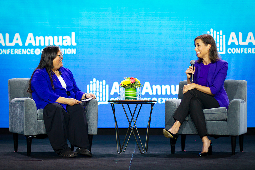 American Library Association (ALA) President Patricia "Patty" M. Wong (left) and Federal Communications Commission Chair Jessica Rosenworcel discuss the state of the digital divide in the US at the Opening Session of ALA's Annual Conference and Exhibition in Washington, D.C., on June 24. Photo by Rebecca Lomax for American Libraries.