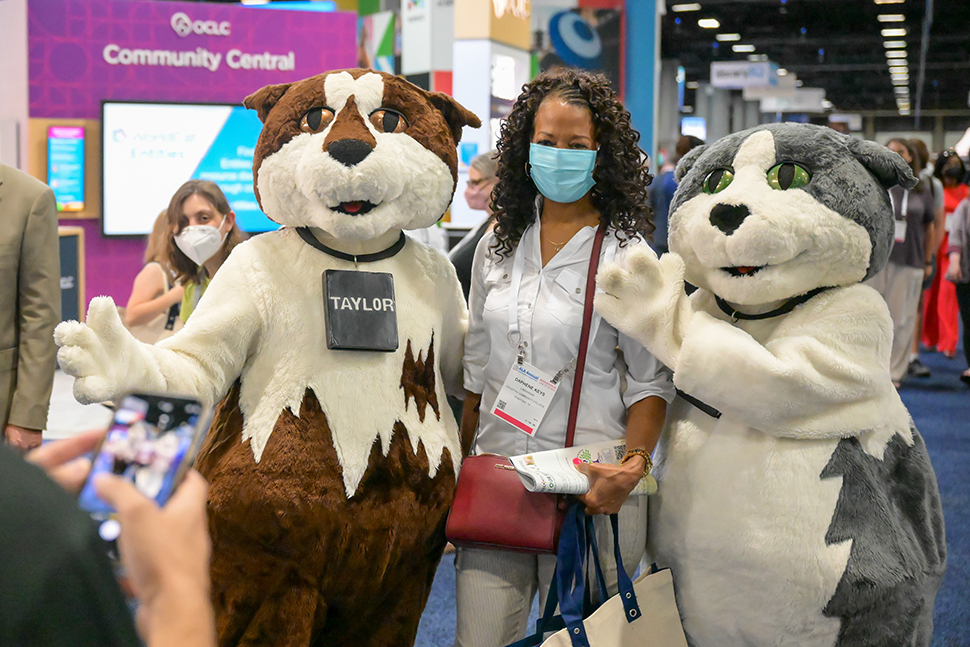 Daphene Keys, public services librarian at Houston Community College, with the Baker & Taylor mascots