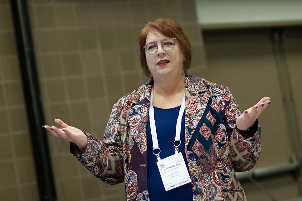 Lyn Haralson, a financial education program analyst at the Consumer Financial Protection Bureau, presents at the American Library Association's 2023 LibLearnX conference in New Orleans on January 28. Photo by Rebecca Lomax of American Libraries.