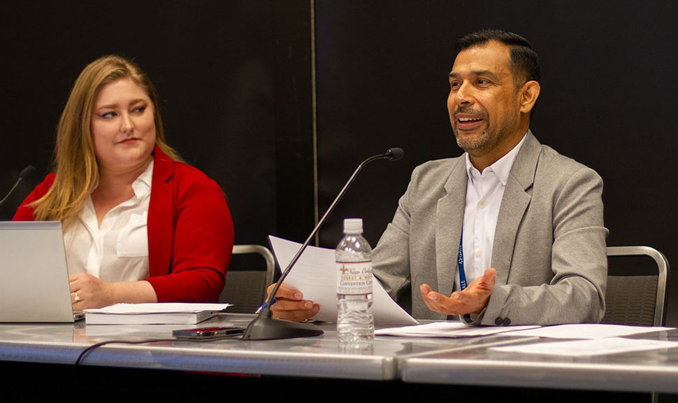 Amanda Vazquez (left), director at Dubuque County (Iowa) District Library, and Sukrit Goswami (right), director at Haverford Township (Pa.) Free Library, discuss how libraries can protect themselves from challenges at the American Library Association's 2023 LibLearnX conference in New Orleans on January 29.
