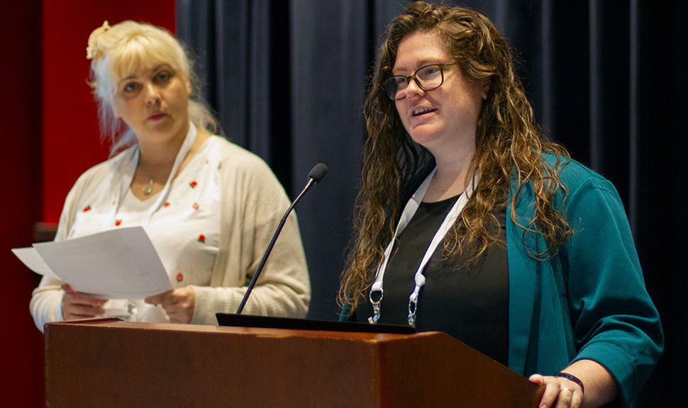 Alyssa Hanson (right) and Melody Dworak speaking at the "Accessible Digital Libraries: Navigating Audiobook Apps with Low-Vision Patrons" session at the 2023 American Library Association Annual Conference in Chicago June 26.