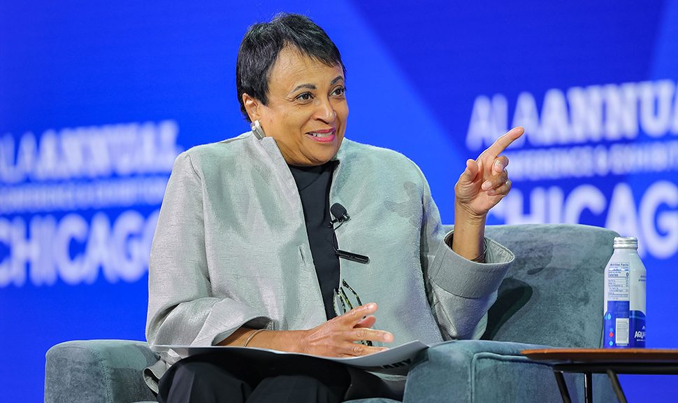 Librarian of Congress Carla Hayden smiles on stage at the "In Conversation with Carla Hayden" session at the ALA Annual Conference