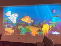 Aquarium display with fish colored by session attendees