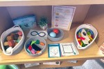 Library Calming Corner with fidgets, art supplies, and coloring sheets