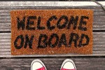 Mat that reads 'Welcome on board'