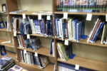 Library shelves being reorganized