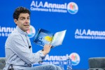 Max Greenfield reads his new book during a June 30 talk at the American Library Association's Annual Conference and Exhibition